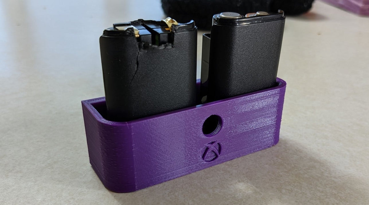 Väggfäste för Xbox 360-batteripaket – prydlig gamingmiljö