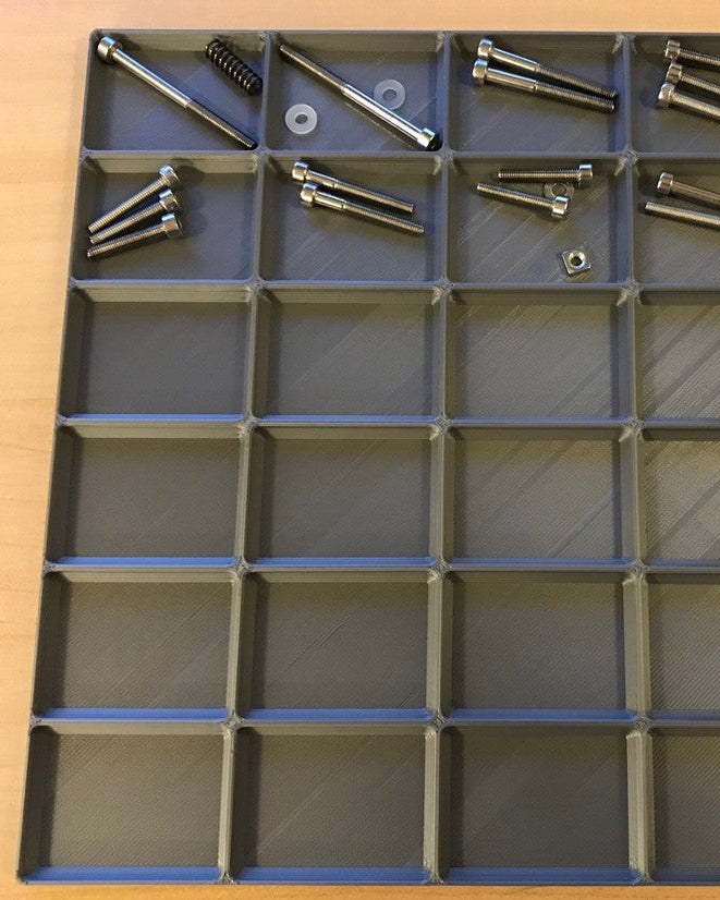 Parametrisk sorteringsbricka för smådelar vid isärtagning