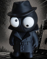 Spider Noir-figur med rörliga ögon, mörk rock och hatt, närbild mot vit bakgrund