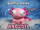 Tokig axolotlfigur med stora rörliga ögon, framifrån