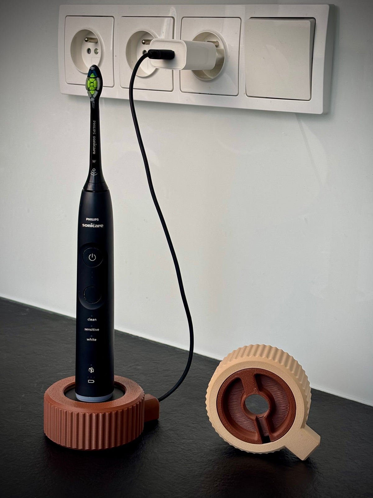 Hållare för Philips Sonicare-laddare med kabelvinda