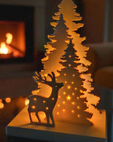 Juldekoration med hjort och träd, bakifrån med fack för värmeljus