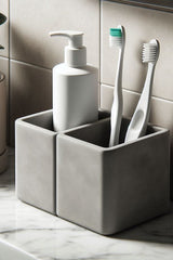 Minimalistisk tandborsthållare med två fack sedd ovanifrån