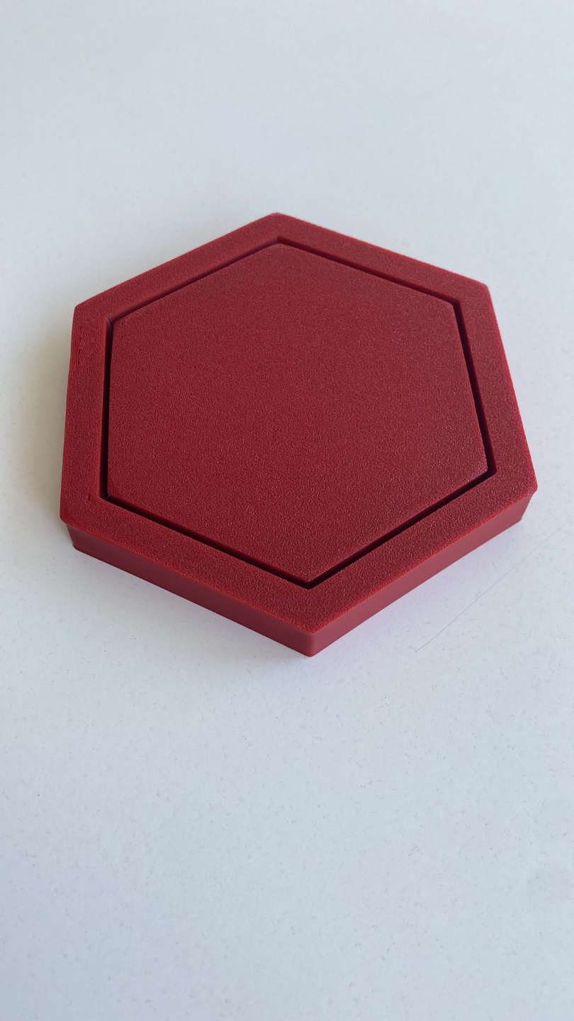 Sexkantigt glasunderlägg ovanifrån med geometrisk form och plan yta
