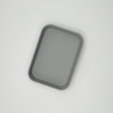 Närbild av den fasade kanten på en minimalistisk nyckelbricka