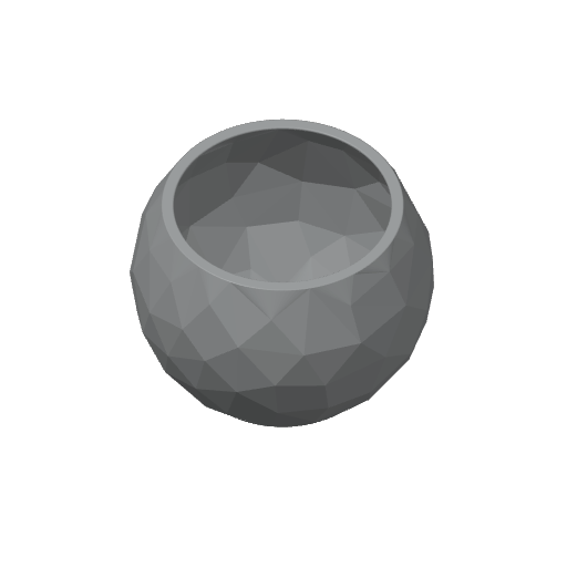 Närbild av en low poly-skål med fasetter inspirerade av sprucken sten och skuggspel