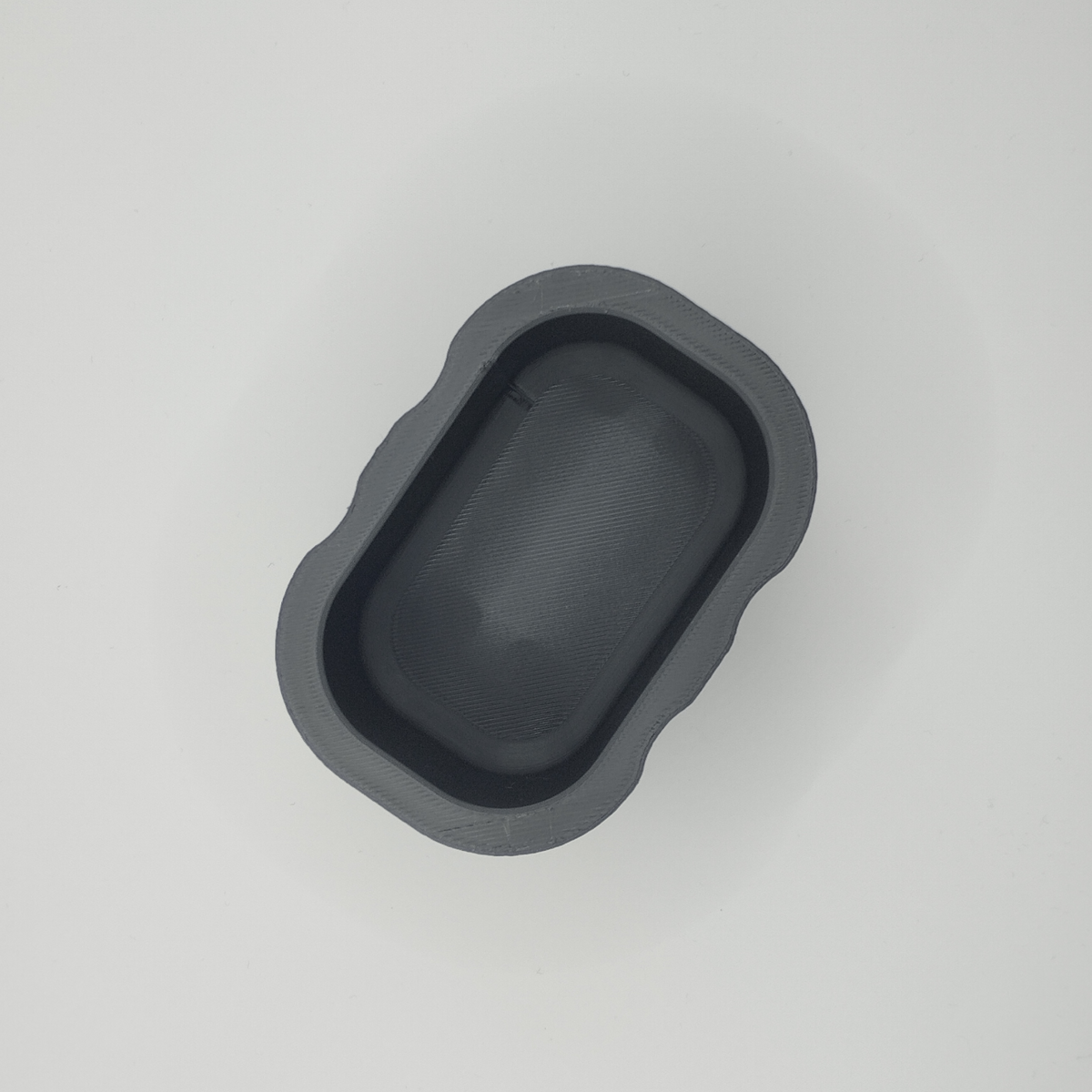 Närbild av den mjuka, luddiga ytan på den minimalistiska svamphållaren