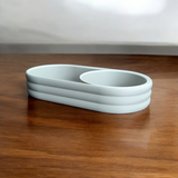 Räfflad yta på en mid century-bricka med skjutbar myntskål