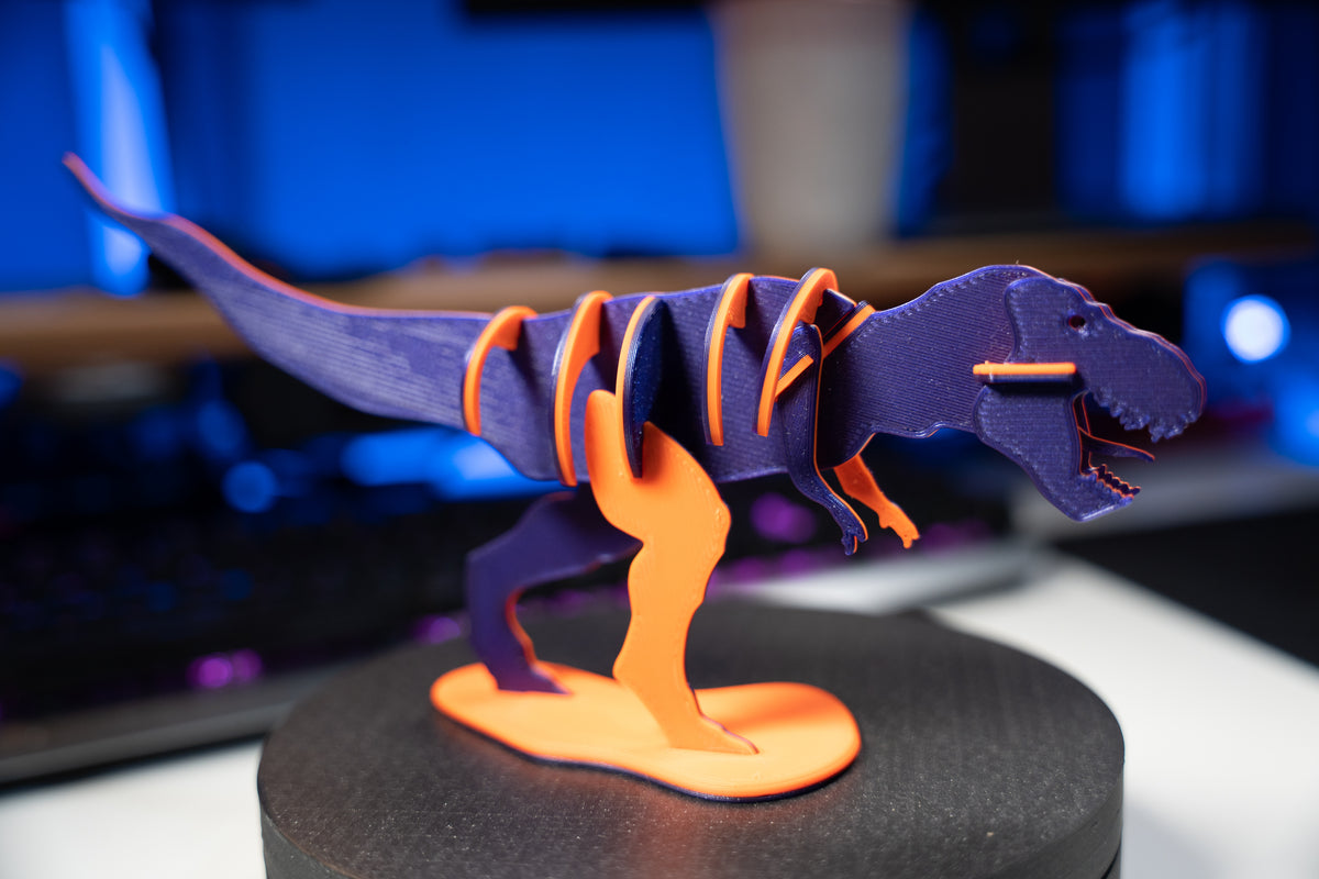 T-Rex-leksaksdinosaurie att skjuta ihop