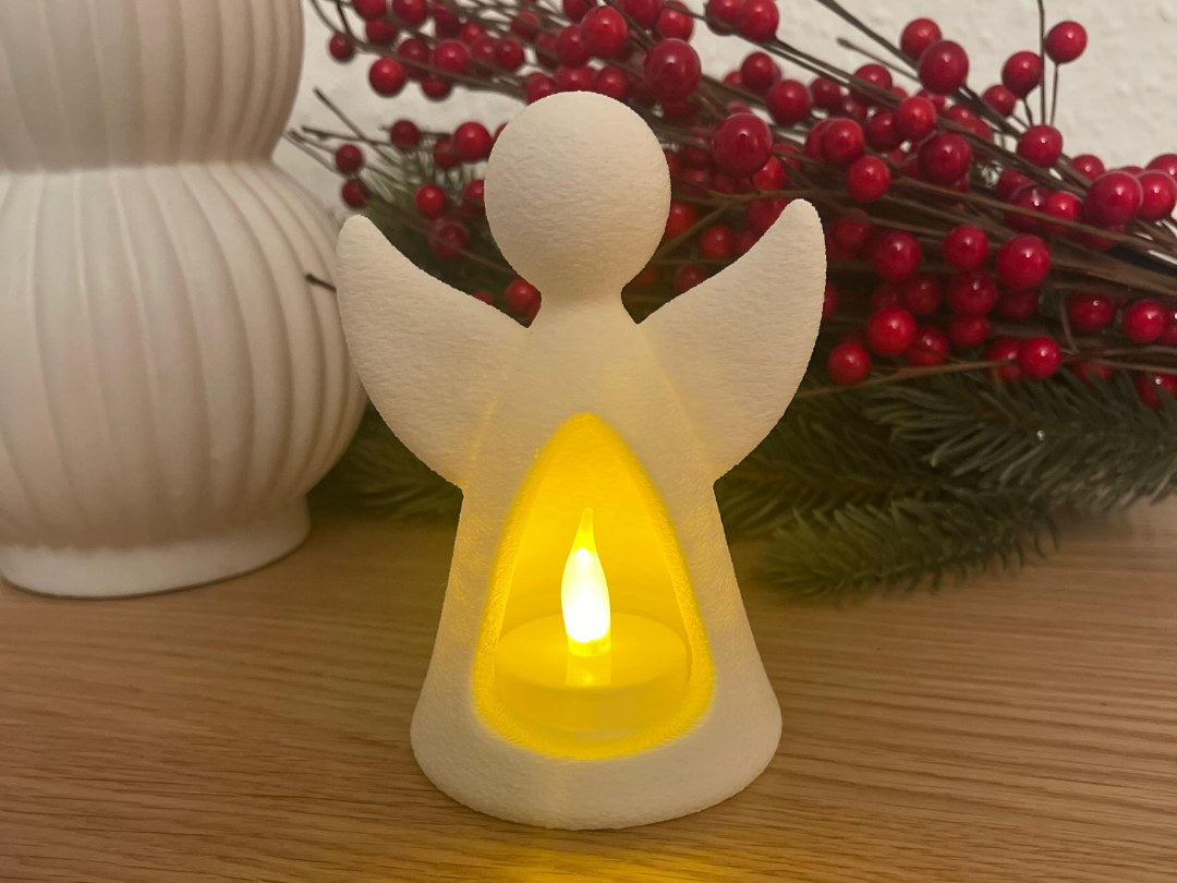 Ängelfigur med LED-värmeljus som lyser inifrån