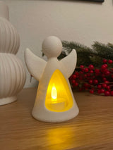 Ängelfigur med LED-värmeljus som lyser inifrån