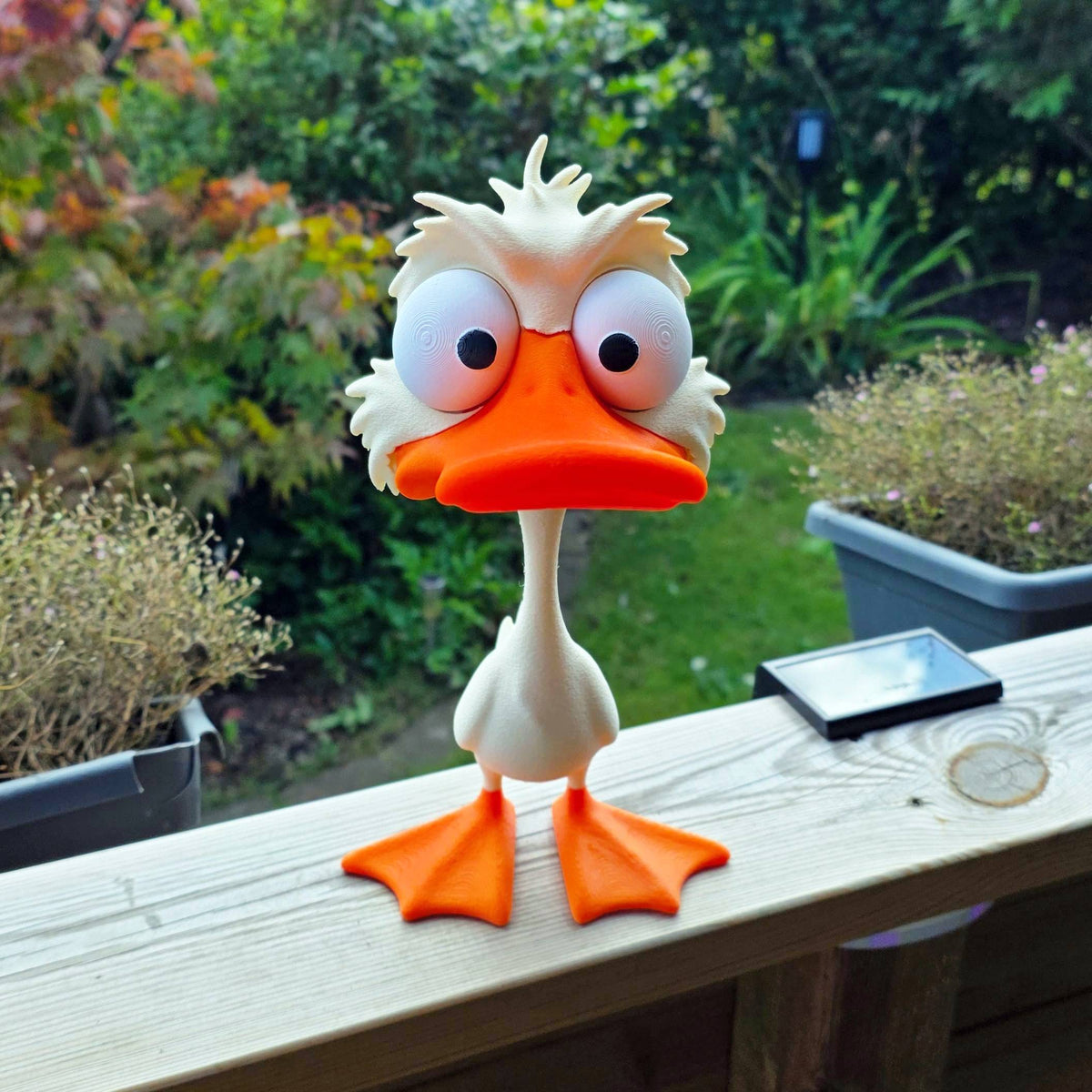 Grinig ankfigur 25 cm – sur dekorationsfigur med stora ögon