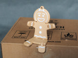 Pepparkaksgumma till jul i brunt och vitt