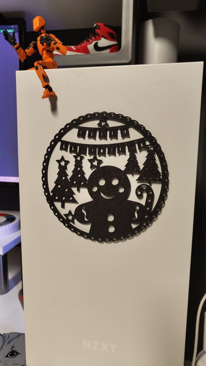 Pepparkaksgubbe i siluett som julig väggdekoration