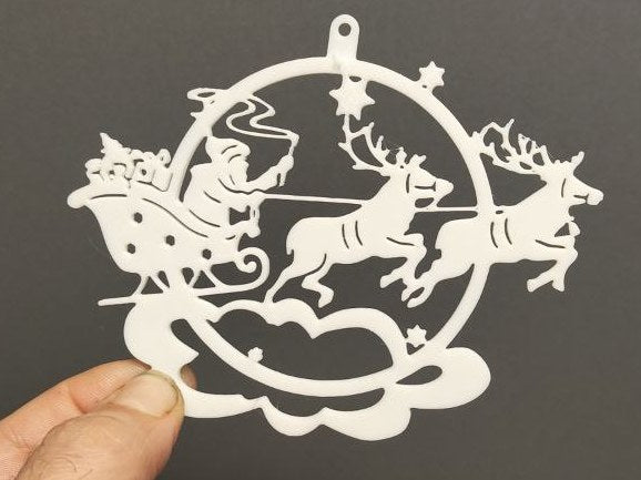 Platt julkula med jultomten