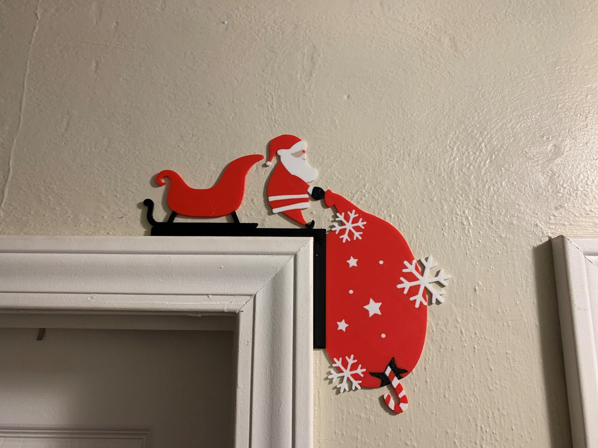 Tomtefigur för dörrkarmen