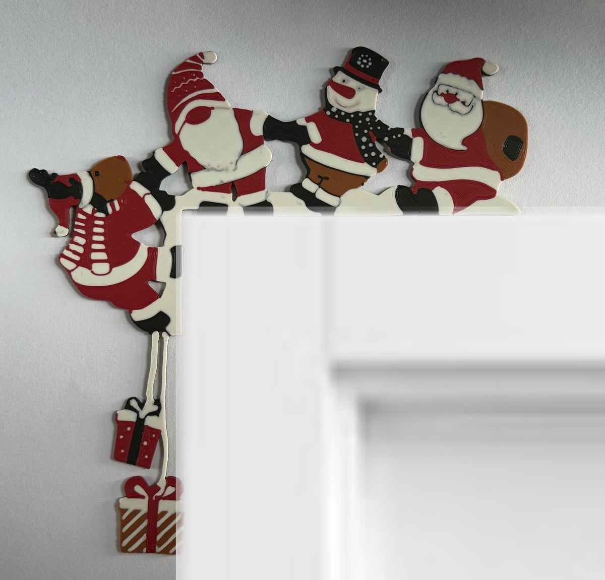 Jultomte som dekoration för dörrhörnet