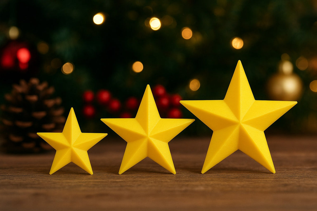 Tre julstjärnor i storlekarna 3, 4 och 5 cm