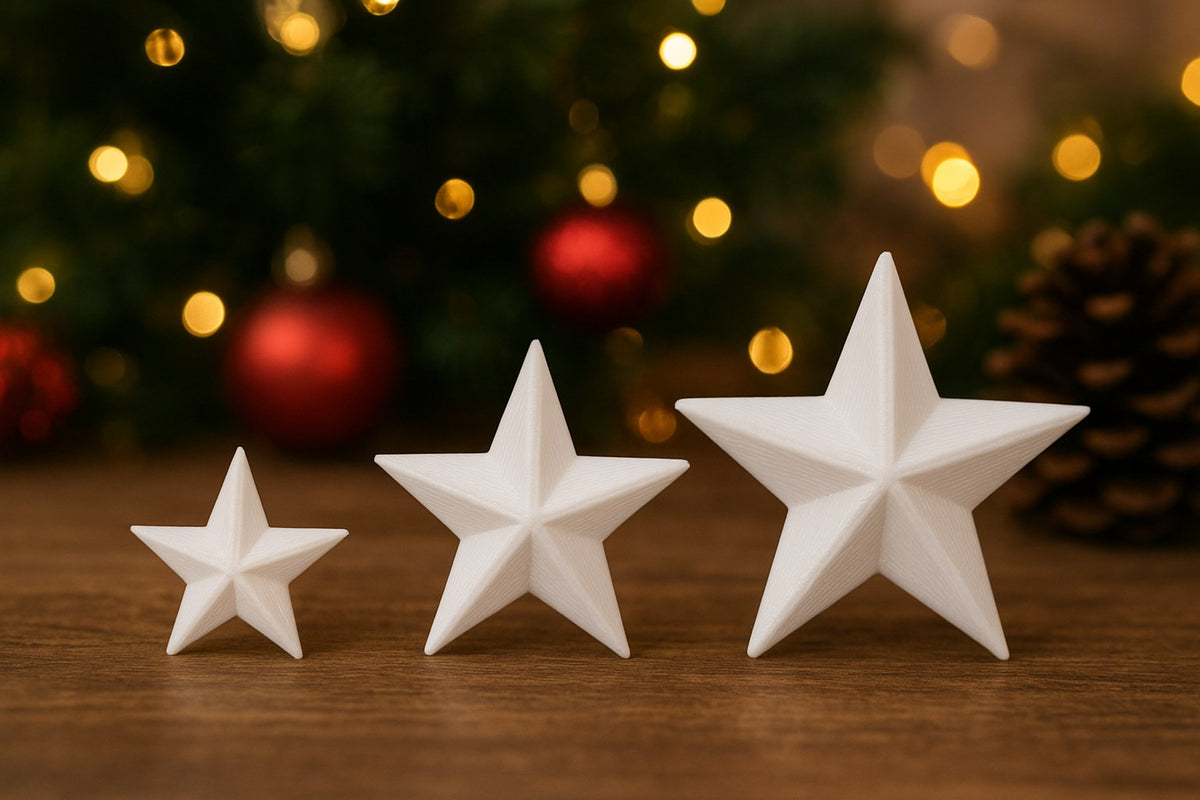 Tre julstjärnor i storlekarna 3, 4 och 5 cm