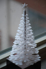 Julgransfigur av snöflingor med stjärna