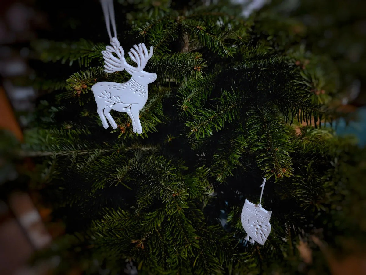 Åtta julgransprydnader formade som djur