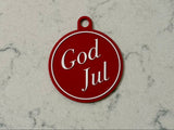 Elegant julgransprydnad med texten God Jul