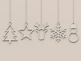 Set med 5 platta julprydnader: julgran, stjärna, ren, snöflinga och snögubbe