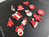 Tolv nyckelringar med julmotiv