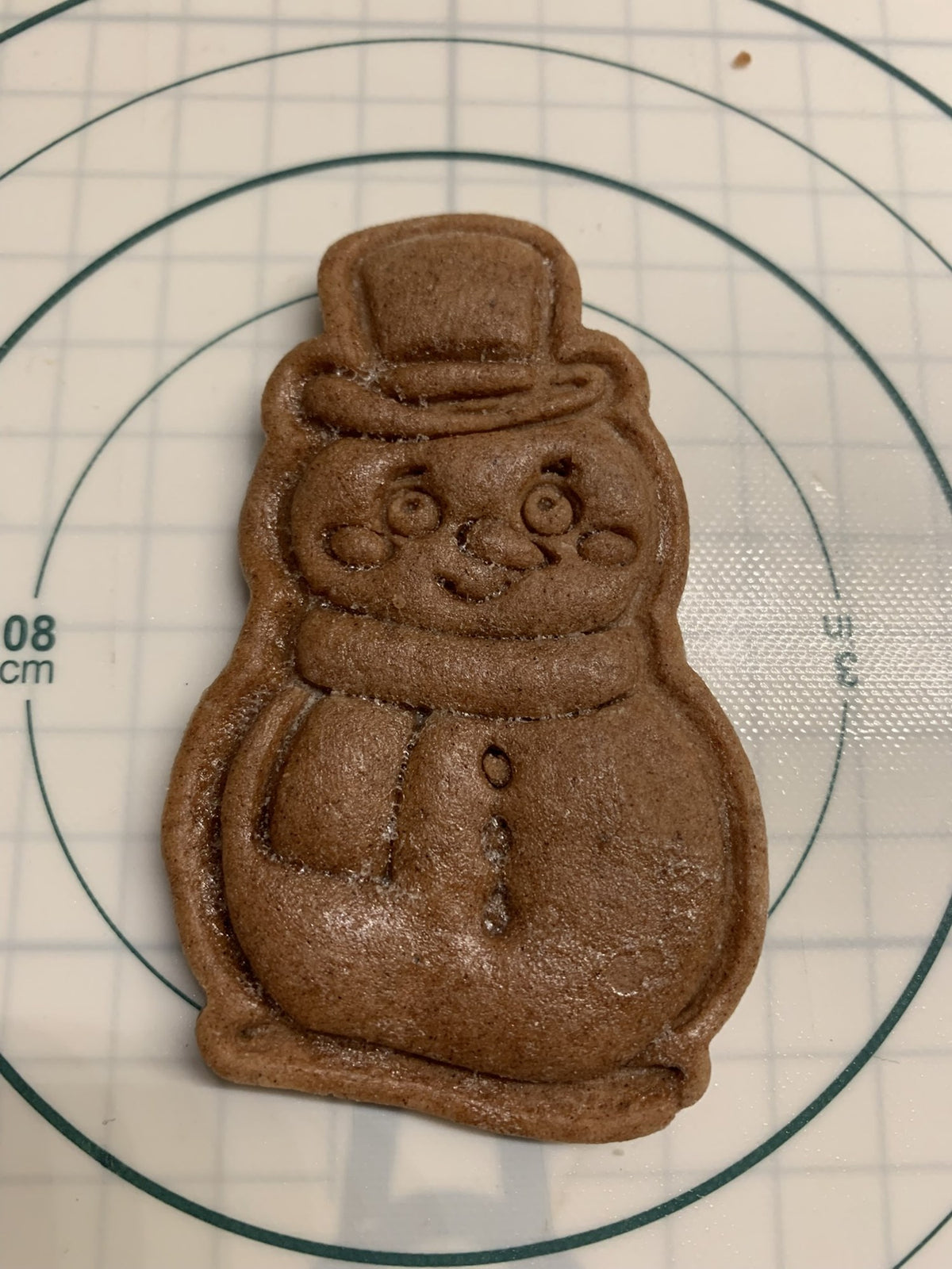 Pepparkaksform formad som en snögubbe