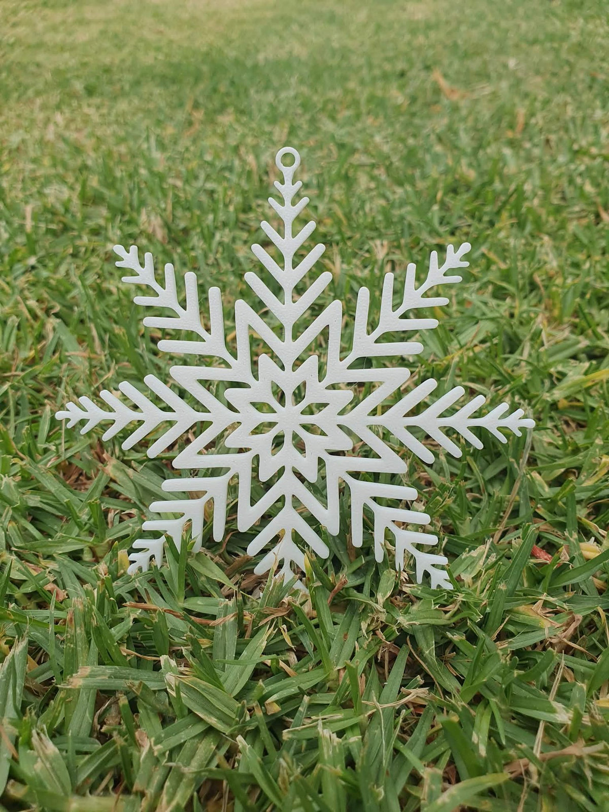 Snöflinga som julgransprydnad