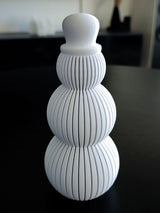Snögubbsfigur i räfflad design