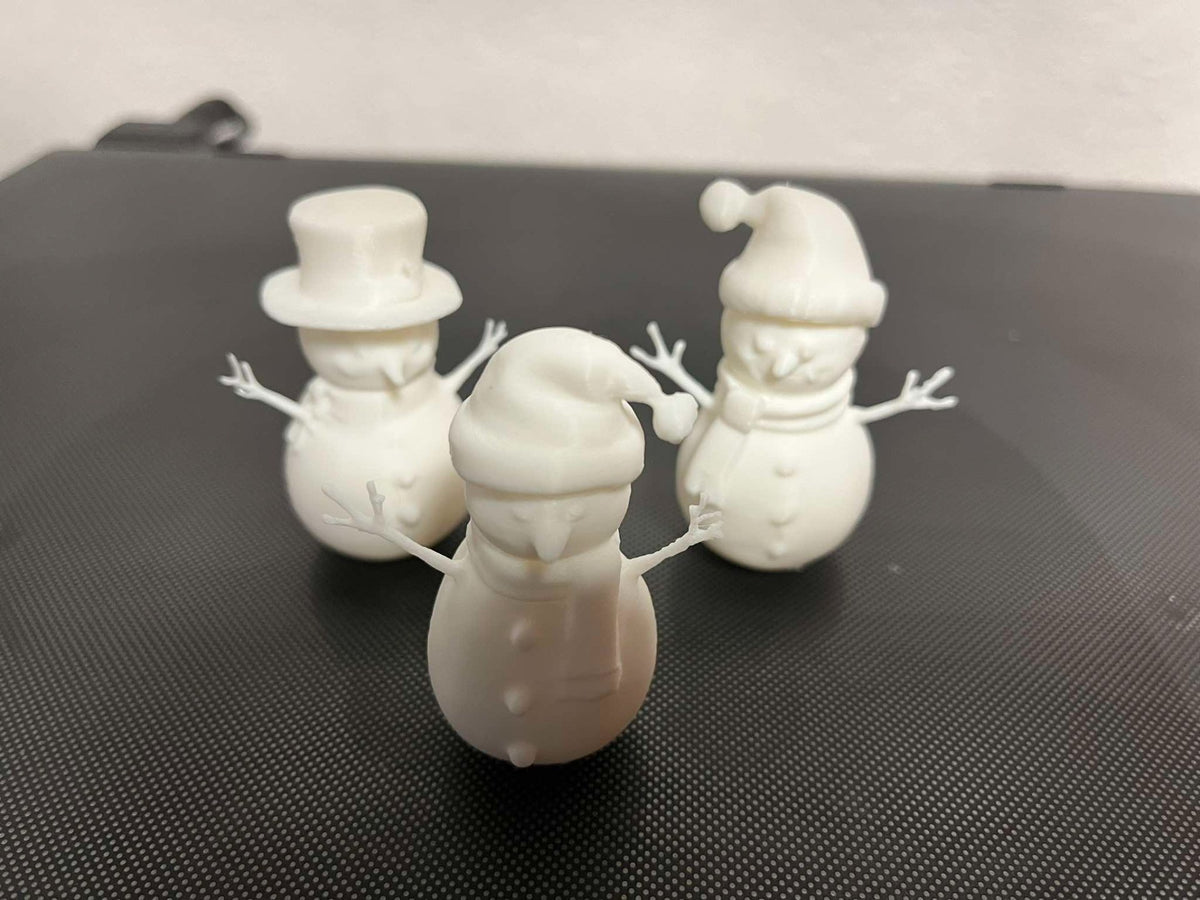 Set med 3 söta snögubbsfigurer