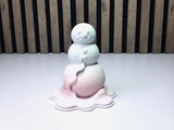 Modern figur av en smältande snögubbe