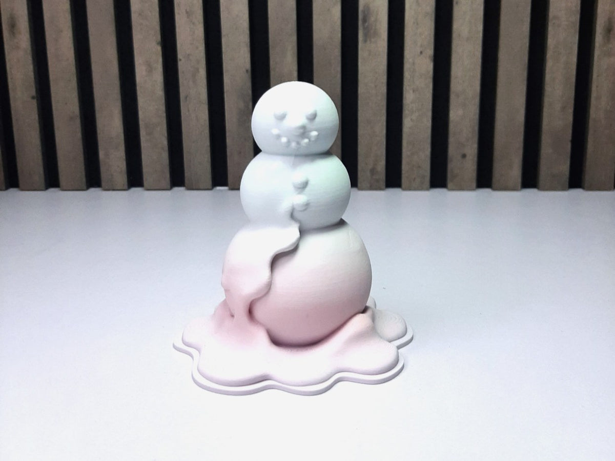 Modern figur av en smältande snögubbe