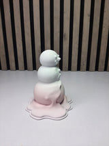 Modern figur av en smältande snögubbe