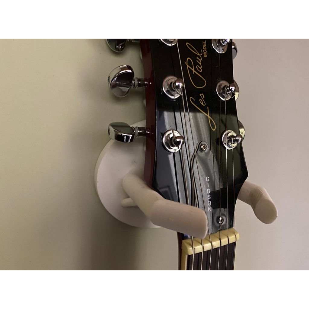 Lätt väggfäste för gitarr