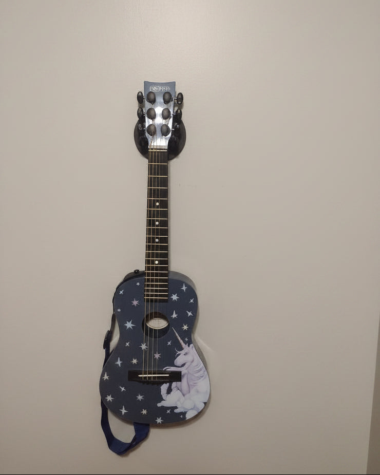 Gitarrhängare för väggen formad som T-Rex-armar