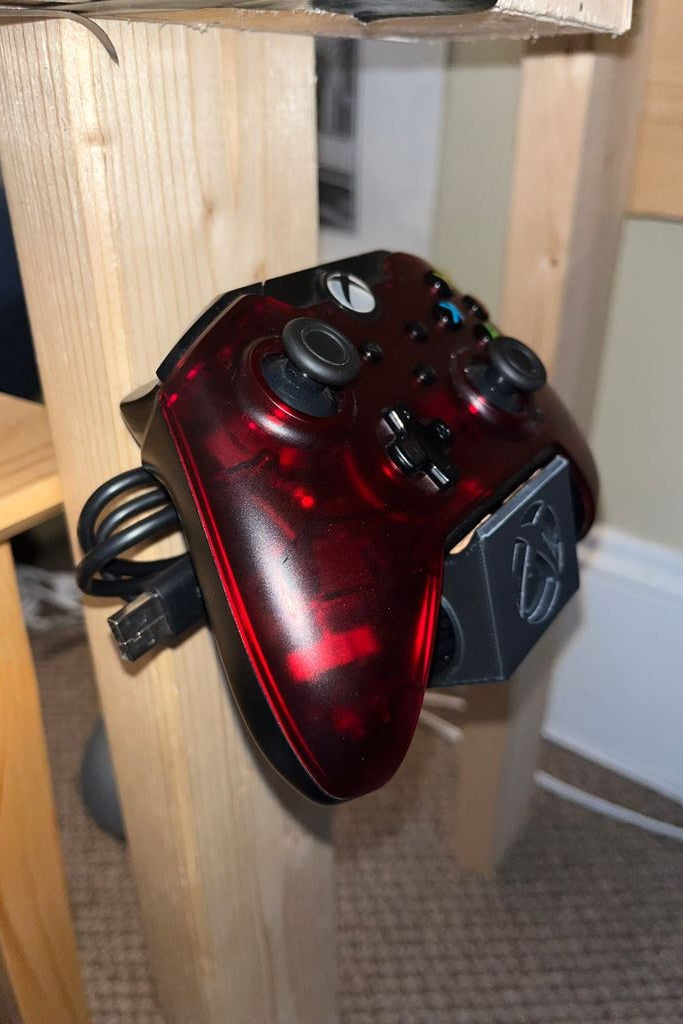 Väggfäste för Xbox-handkontroll med kabelhantering