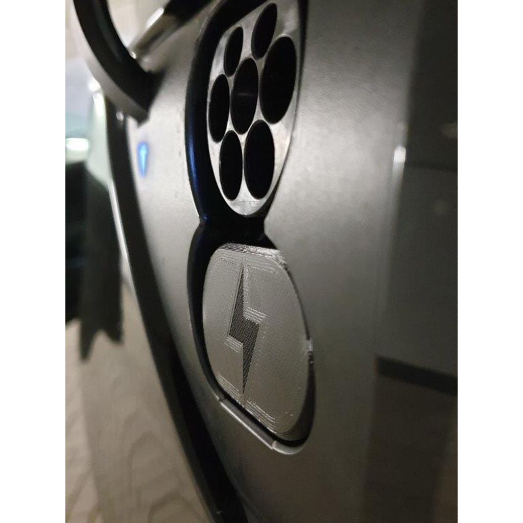 Lock för CCS-laddport på Tesla Model 3