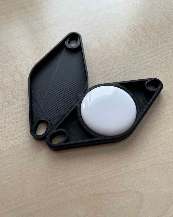 Apple AirTag-cykelfäste under flaskhållaren