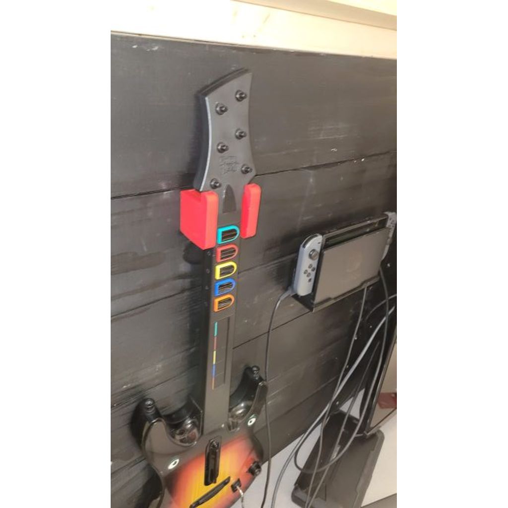 Väggfäste för Guitar Hero-handkontroll med låskant