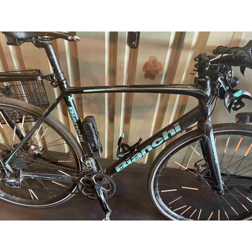 Fäste för Tile-tracker på cykelns flaskhållare
