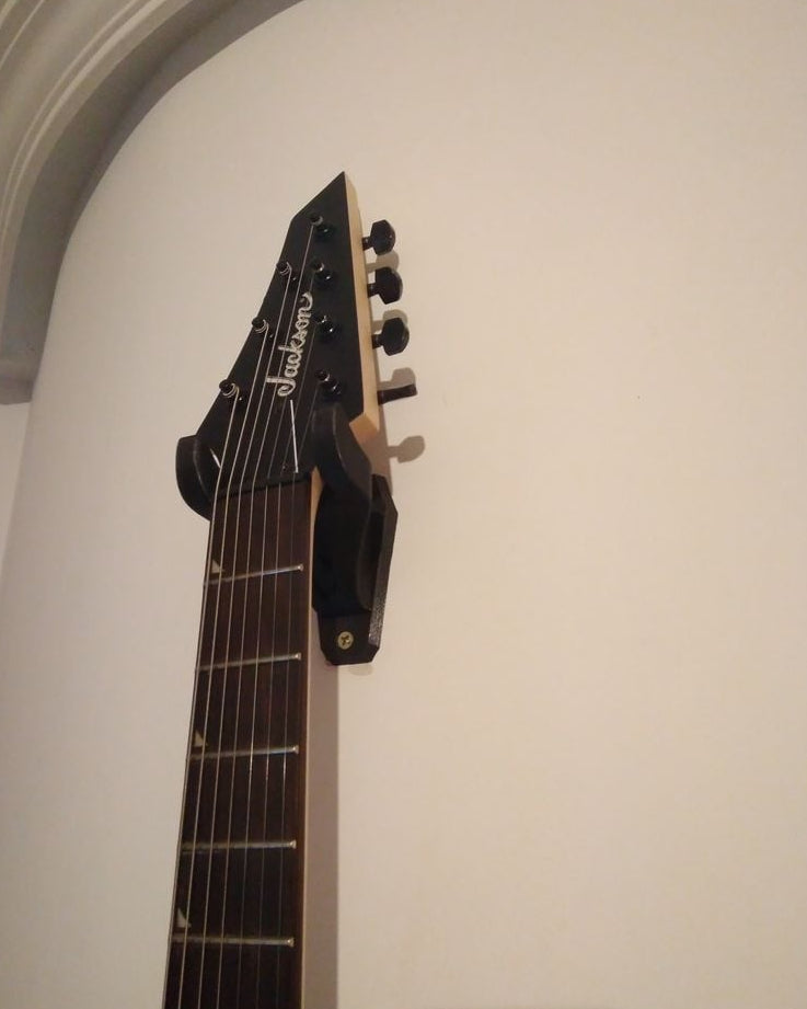 Väggfäste för 7-strängad gitarr med Gojira-logga